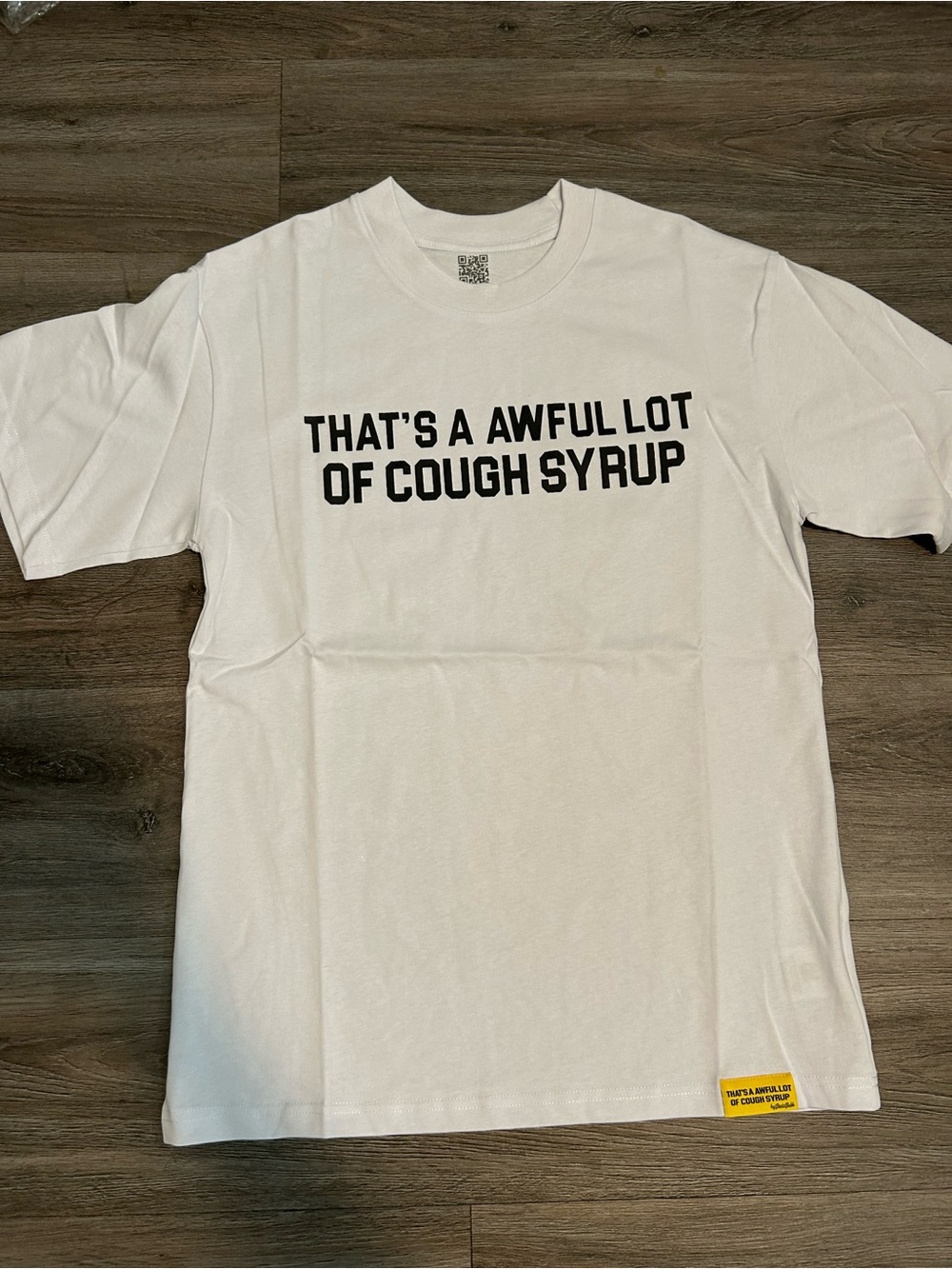 White Graphic Short Sleeve Tee with Bold Black Text
